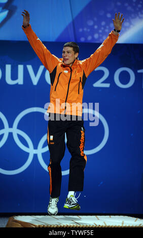 Sven Kramer of the Netherlands celebrates his gold medal in men's 5000 meter speed skating during a Medal Ceremony at BC Place in Vancouver, Canada, during the 2010 Winter Olympics on February 14, 2010.     UPI/Roger L. Wollenberg Stock Photo