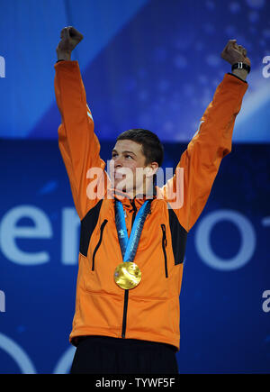 Sven Kramer of the Netherlands celebrates his gold medal in men's 5000 meter speed skating during a Medal Ceremony at BC Place in Vancouver, Canada, during the 2010 Winter Olympics on February 14, 2010.     UPI/Roger L. Wollenberg Stock Photo