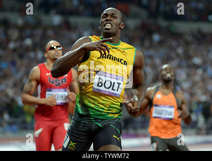 Jamaica's Usain Bolt wins the gold medal in the Men's 200M Final at Olympic Stadium during the London 2012 Summer Olympics in Olympic Park in Stratford, London on August 9, 2012.  Bolt became the first Olympican to win the 100M and 200M race in consecutive Olympics. His time was 19.32.  Jamaica swept the race with teammates Yohan Blake getting the silver and Warren Weir the bronze medal.     UPI/Pat Benic Stock Photo