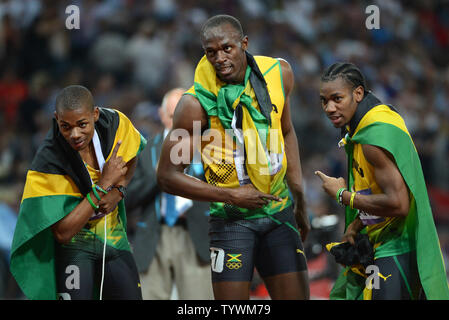 Jamaica's Usain Bolt poses with teammates Yohan Blake (R) and  Warren Weir  (L) after winning the gold medal in the Men's 200M Final at Olympic Stadium during the London 2012 Summer Olympics in Olympic Park in Stratford, London on August 9, 2012.  Bolt became the first Olympian to win the 100M and 200M race in consecutive Olympics. His time was 19.32.  Jamaica swept the race with teammates Yohan Blake getting the silver and Warren Weir the bronze medal.    UPI/Pat Benic Stock Photo