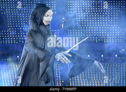 A grim reaper figure is seen during the tribute to health care scene during the Opening Ceremony of the London 2012 Summer Olympics on July 27, 2012 in Stafford, London. The show, created by Academy Award winning director Danny Boyle, celebrates England's history through the use of pop-culture and history.  UPI/Pat Benic Stock Photo