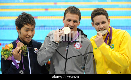Gold medal winner USA's Ryan Lochte, Silver medalist Brazil's Thiago Pereira (R) and Japan's Kosuke Hagino (L) enjoy their  medals after the Men's 400 Individual Medley Final at the Aquatics Center during the London 2012 Summer Olympics in Stratford, London on July 28, 2012.    Lochte's winning time was 4:05.18   UPI/Pat Benic Stock Photo