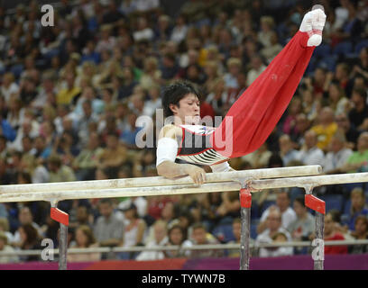 Japanese gold medal hopeful Kohei Uchimura performs his routine on the parallel bars during men's gymnastics qualifications at the Greenwich North Arena at the 2012 Summer Olympics, July 28, 2012, in London, England. Orozco has won three consecutive world championships and is considered Japan's best hope for gold.           UPI/Mike Theiler Stock Photo