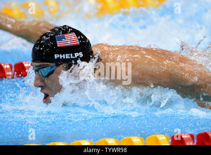 USA's Michael Phelps glides through the water to a Gold Medal in the  Men's 100 Butterfly Final at the Aquatics Center during the London 2012 Summer Olympics in Stratford, London on August 3, 2012.    UPI/Pat Benic Stock Photo