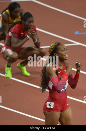 American sprinter Sanya Richards-Ross raises her arms in jubilation after winning the gold medal at the Women's 400m final, at the 2012 Summer Olympics, August 5, 2012, in London, England.             UPI/Mike Theiler