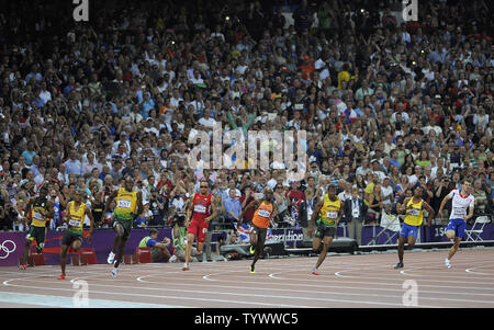 Usain Bolt of Jamaica (third from left) competes in the Men's 200M Final at the London 2012 Summer Olympics on August 9, 2012 in Stratford, London. Bolt won a Gold Medal with a time of 19.32 seconds in the final.     UPI/Brian Kersey Stock Photo