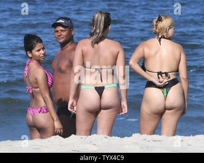 chubby teen nudists Sunday beachgoers enjoy the sun at the Marina da Gloria sailing venue for  the 2016 Olympic Games in Rio de Janeiro, Brazil on July 31, 2016. Photo by  Terry Schmitt Stock Photo - Alamy