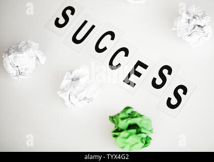 Success word written on white table. Copy space Stock Photo