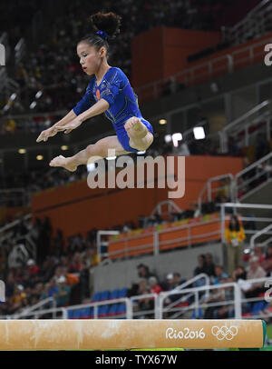 Shang Chunsong of China competes in the balance beam competition at the Women's Individual all around in artistic gymnastics at HSBC Arena (Arena Ol’mpica do Rio) at the 2016 Rio Summer Olympics in Rio de Janeiro, Brazil, on August 11, 2016.    Photo by Terry Schmitt/UPI Stock Photo