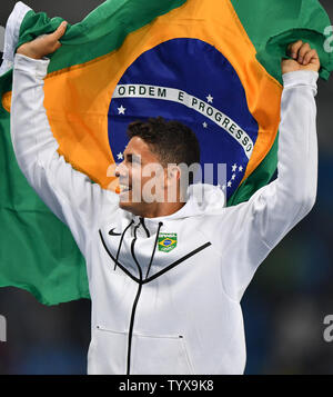 Pole vault gold medal winner Thiago Braz Da Silva of Brazil celebrates in the Olympic Stadium at the 2016 Rio Summer Olympics in Rio de Janeiro, Brazil, on August 15, 2016. Kevin Dietsch/UPI Stock Photo