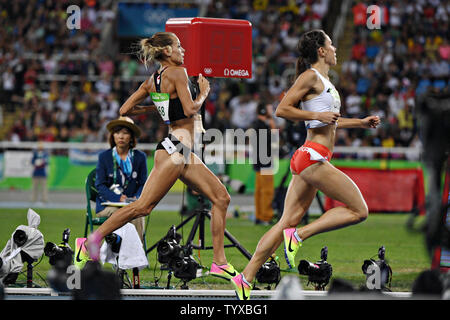 Joanna Jozwik of Poland passes Canada Melissa Bishop competing in the Women's 800m Semifinal 2 at the 2016 Rio Summer Olympics in Rio de Janeiro, Brazil, on August 18, 2016.   Photo by Richard Ellis/UPI Stock Photo