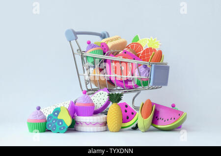 Shopping cart is filled to the top with fresh fruits on a purple background. The concept of buying food and fruit online. Diet food Stock Photo