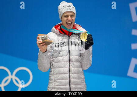 Men's normal hill ski jumping gold medalist Andreas Welling of Germany celebrates during a medal ceremony for the Pyeongchang 2018 Winter Olympics, at the Olympic Medal Plaza in Daegwalnyeong, South Korea, on February 11, 2018.  Photo by Matthew Healey/UPI Stock Photo