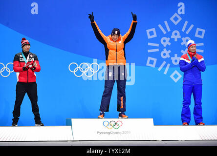 Gold medalist Netherland's Sven Kramer (C) celebrates alongside Silver medalist Canada's Ted-Jan Bloemen (L) and bronze medalist Norway's Sverre Pedersen during the medal ceremony for Men's Speed Skating 5,000 meter during the Pyeongchang 2018 Winter Olympics in Pyeongchang, South Korea, on February 12, 2018.  Photo by Kevin Dietsch/UPI Stock Photo