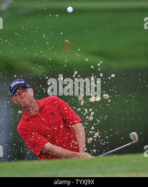 Davis Love III hits out of a bunker on the 17th hold during the second round of the Arnold Palmer Invitational at the Bay Hill Club and Lodge in Orlando, Florida on March 26, 2010. UPI/Kevin Dietsch Stock Photo