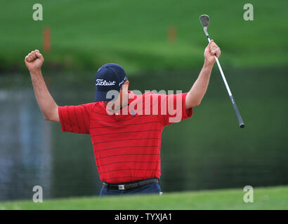 Davis Love III celebrates after sinking a chip from out of a bunker on the 17th hold during the second round of the Arnold Palmer Invitational at the Bay Hill Club and Lodge in Orlando, Florida on March 26, 2010. UPI/Kevin Dietsch Stock Photo