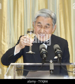 Visiting Canada with his wife Empress Michiko, Japan's  Emperor Akihito makes a toast during a State Dinner hosted by Michaelle Jean, Governor General of Canada and her husband Jean Daniel Lafond at Rideau Hall in the Canadian capital of Ottawa, Ontario, July 6, 2009.   (UPI Photo/Heinz Ruckemann) Stock Photo