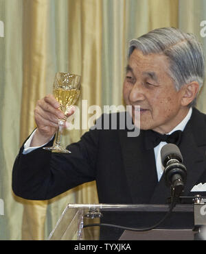 Visiting Canada with his wife Empress Michiko, Japan's  Emperor Akihito makes a toast during a State Dinner hosted by Michaelle Jean, Governor General of Canada and her husband Jean Daniel Lafond at Rideau Hall in the Canadian capital of Ottawa, Ontario, July 6, 2009.   (UPI Photo/Heinz Ruckemann) Stock Photo
