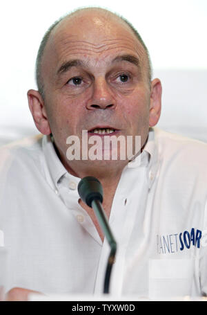 French sailor Gerard d'Aboville, famed for his solo rowing across the Atlantic and the Pacific Oceans, speaks during a news conference about the Planet Solar trimaran which will circumnavigate the globe powered only by solar energy, in Paris on November 28, 2006. The trimaran, equipped with silent and non-polluting motorization, is to be co-captained by d'Aboville and Swiss project founder Raphael Domjan. (UPI Photo/Eco Clement) Stock Photo