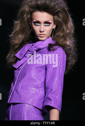 A model wears an outfit at the Christian Dior Fall-Winter 2008/2009 ready-to-wear Paris Fashion Week, February 25, 2008. (UPI Photo) Stock Photo