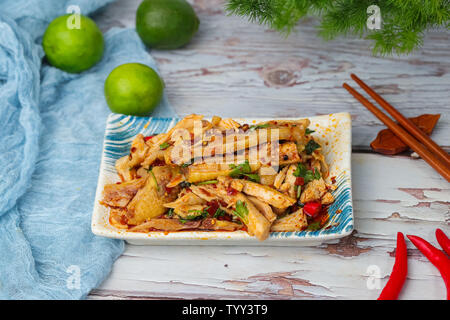 drooling chicken, stick chicken. Stock Photo