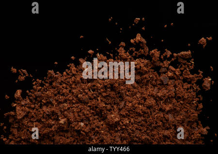 Fresh roasted ground coffee macro close up view Stock Photo