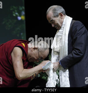 French Senator and former justice minister Robert Badinter (R) is honored by the Dalai Lama for his work against the death penalty during a conference at Bercy in Paris on June 7, 2009.  Later today, despite protests from China's government, the Dalai Lama will be made an honorary citizen of Paris by mayor Betrand Delanoe.     (UPI Photo/ David Silpa) Stock Photo