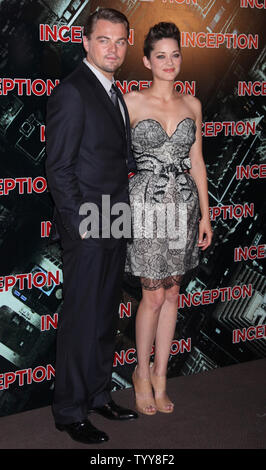 Leonardo Di Caprio (L) and Marion Cotillard arrive at the French premiere of the film 'Inception' in Paris on July 10, 2010.     UPI/David Silpa Stock Photo