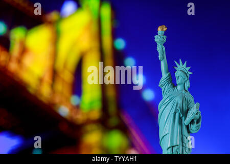 The Statue of Liberty Brooklyn Bridge in light at Night Lights, New York City Stock Photo