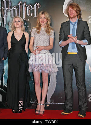 Evanna Lynch (L), Clemence Poesy (C) and Domhnall Gleeson arrive at the French premiere of the film 'Harry Potter and the Deathly Hallows: Part 2' in Paris on July 12, 2011.     UPI/David Silpa Stock Photo