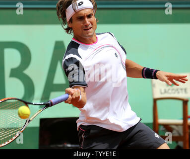Spaniard David Ferrer hits a shot during his French Open men's semifinal match against Spaniard Rafael Nadal at Roland Garros in Paris on June 8, 2012.   UPI/David Silpa Stock Photo