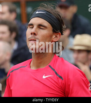 Spaniard Rafael Nadal reacts after a point during his French Open men's final match against Serbian Novak Djokovic at Roland Garros in Paris on June 10, 2012.   UPI/David Silpa Stock Photo