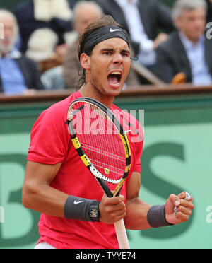Spaniard Rafael Nadal reacts after a point during his French Open men's final match against Serbian Novak Djokovic at Roland Garros in Paris on June 10, 2012.   UPI/David Silpa Stock Photo