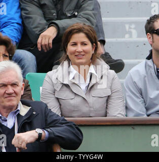 Mirka Federer watches the French Open men's third round match between Julien Benneteau of France and her husband Roger Federer of Switzerland at Roland Garros in Paris on May 31, 2013.  Federer defeated Benneteau 6-3, 6-4, 7-5.   UPI/David Silpa Stock Photo