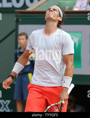 Spaniard Rafael Nadal reacts after a shot during his French Open men's quarterfinal match against Stanislas Wawrinka of Switzerland at Roland Garros in Paris on June 5, 2013.  Nadal defeated Wawrinka 6-2, 6-3, 6-1.   UPI/David Silpa Stock Photo