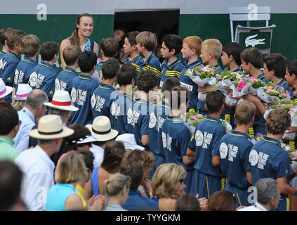 Former Swiss tennis player Martina Hingis arrives on the court during a ceremony celebrating the 40th anniversary of the Women's Tennis Association at Roland Garros in Paris on June 6, 2013.   UPI/David Silpa Stock Photo