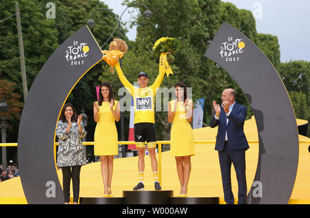 Chris Froome of Great Britain celebrates on the presentation podium after winning the Tour de France in Paris on July 23, 2017. Froome claimed his fourth Tour de France victory.   Photo by David Silpa/UPI Stock Photo
