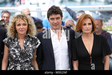 Valeria Golino (L), Riccardo Scarmarcio (C) and Isabella Ferrari arrive at a photocall for the film 'Euforia' during the 71st annual Cannes International Film Festival in Cannes, France on May 15, 2018.  Photo by David Silpa/UPI Stock Photo