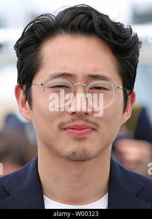 Steven Yeun arrives at a photocall for the film 'Burning' during the 71st annual Cannes International Film Festival in Cannes, France on May 17, 2018.  Photo by David Silpa/UPI Stock Photo