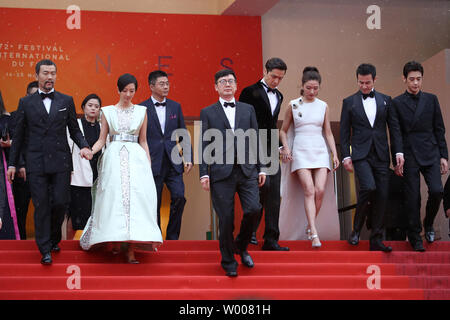(From L to R) Shen Yang, Li Li, Dong Jiongsong, Liao Fan, Gwei Lun Mei, Diao Yinan and Zhang Yicong arrive on the red carpet after the screening of the film 'The Wild Goose Lake' at the 72nd annual Cannes International Film Festival in Cannes, France on May 18, 2019.  Photo by David Silpa/UPI Stock Photo