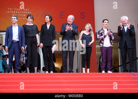 (From L to R) Othmane Moumen, Carol Duarte, Myriem Akheddiou, Luc Dardenne, Victoria Bluck, Idir Ben Addi and Jean-Pierre Dardenne arrive on the red carpet after the screening of the film 'Young Ahmed' at the 72nd annual Cannes International Film Festival in Cannes, France on May 20, 2019.  Photo by David Silpa/UPI Stock Photo