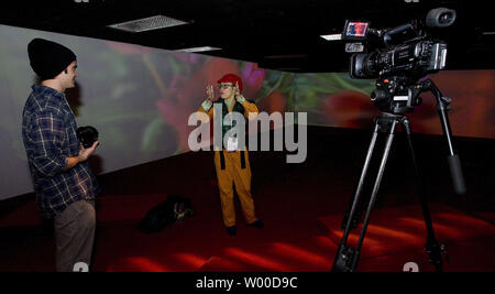 Swiss artist Pipilotti Rist (C) gives an interview with her undulating video installation called Lobe of Lung at the opening of the New Frontier on Main Street exhibition at the 2010 Sundance Film Festival on January 21, 2010 in Park City, Utah.         UPI/Gary C. Caskey.. Stock Photo