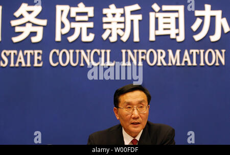 Li Bengong, executive deputy director of the China National Committee on Aging, speaks at a press conference outlining programs for senior citizens in Beijing on December 12, 2006. China will gather more retirement funds and add more beds for elderly people to keep pace with its growing number of elders, which will double to 280 million by 2025, the State Council said in a statement today.   (UPI Photo/Stephen Shaver) Stock Photo