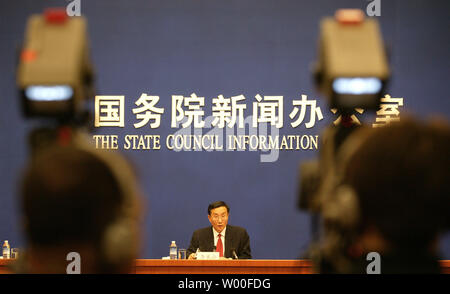 Li Bengong, executive deputy director of the China National Committee on Aging, speaks at a press conference outlining programs for senior citizens in Beijing on December 12, 2006. China will gather more retirement funds and add more beds for elderly people to keep pace with its growing number of elders, which will double to 280 million by 2025, the State Council said in a statement today.   (UPI Photo/Stephen Shaver) Stock Photo