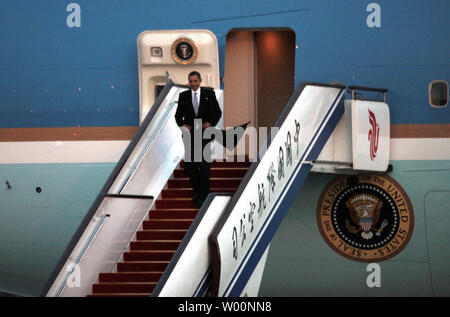 U.S. President Barack Obama deplanes Air Force One after arriving at Beijing's International Airport on November 16, 2009. Obama is on his first state visit to China and will spend three days in Beijing talk with the country's top Communist leaders on forging stronger bilateral ties.      UPI/Stephen Shaver Stock Photo