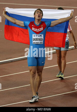 https://l450v.alamy.com/450v/w018nw/russias-sergey-shubenkov-reacts-after-his-upset-win-in-the-110-meters-hurdles-final-at-the-iaaf-world-championships-being-hosted-by-beijing-on-august-28-2015-shubenkov-upset-the-field-with-a-1298-second-win-a-national-record-jamaicas-hensie-parchment-1303-finished-second-and-usas-aries-merritt-1304-third-photo-by-stephen-shaverupi-w018nw.jpg