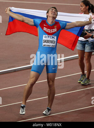 Russia's Sergey Shubenkov reacts after his upset win in the 110 meters  Hurdles final at the