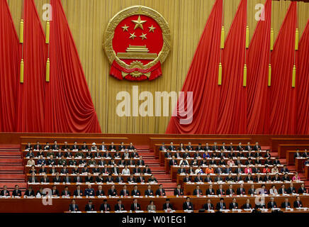 Chinese President Xi Jinping, Premier Li Keqiang and China's top government leaders attend the closing session of the National People's Congress (NPC) in the Great Hall of the People in Beijing on March 20, 2018.  Xi delivered a fervently nationalistic speech to the congress, painting China as the rising global power.   Photo by Stephen Shaver/UPI Stock Photo