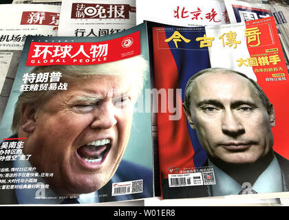 Two Of China S Top Editorial Magazines That Focus On International News Have Contrasting Covers Featuring U S President Donald Trump And Russian President Vladimir Putin Stories At A Newsstand In Beijing On April