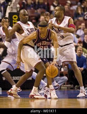 Kerry Kittles of the New Jersey Nets jams in 2 of his 18 points against the  Washington Wizards in a game won in overtime by the Nets 103-99 on March  31, 2004